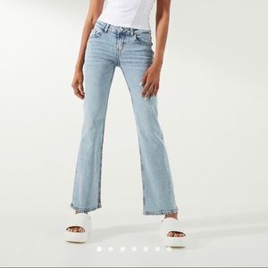 Divided light denim blue, low rise flare legged jeans
